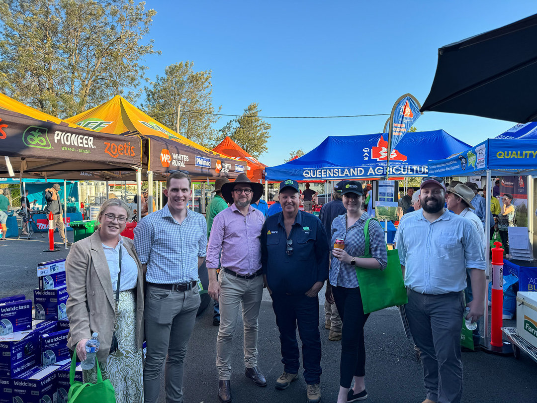 CoBright and RAFF Group team members pose together for a photo at the RAFF Group Roadshow event. They are surrounded by many different products and stalls.
