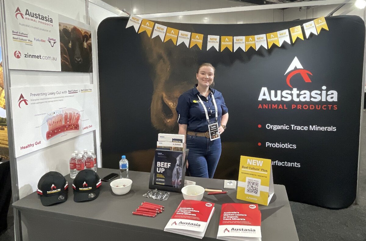 Caitlin from CoBright stands in behind the Austasia stall at BeefEx 2024
