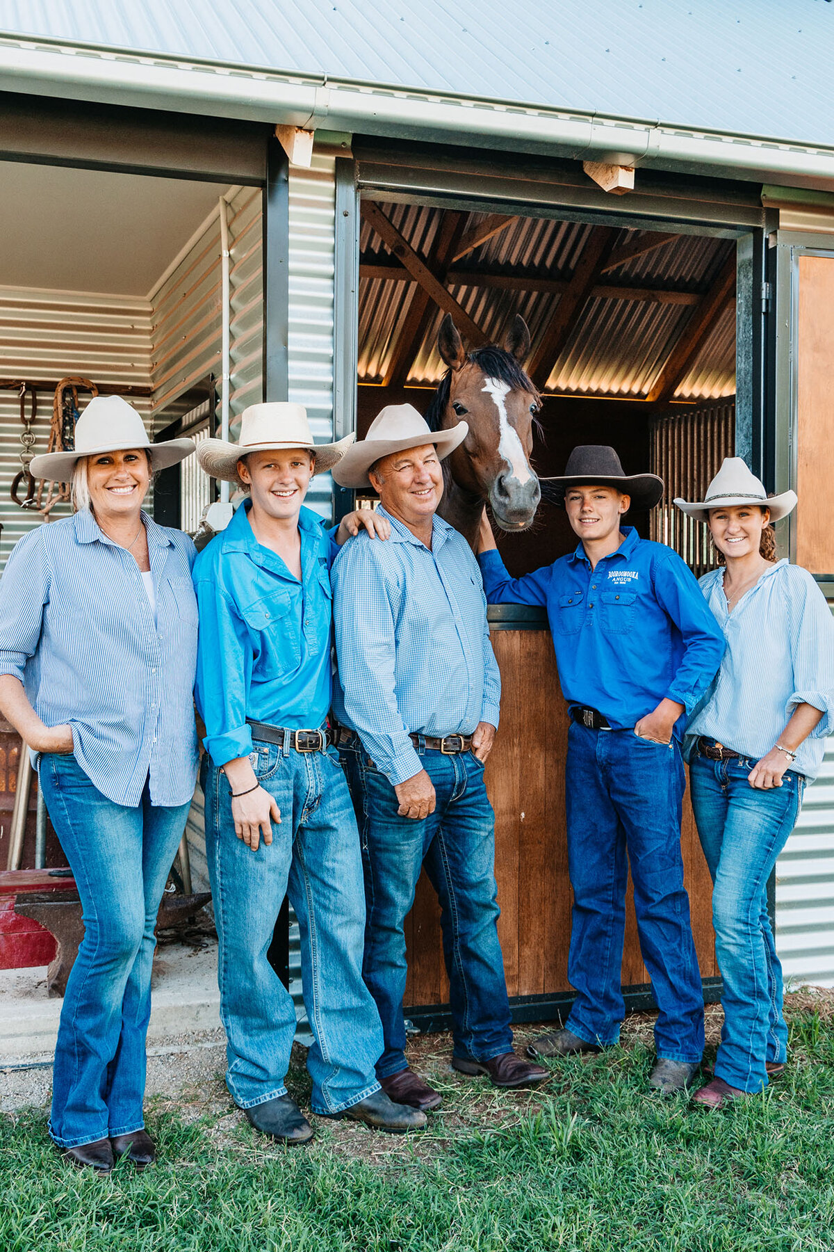 Booroomooka's Munro Family posing together with a Horse.